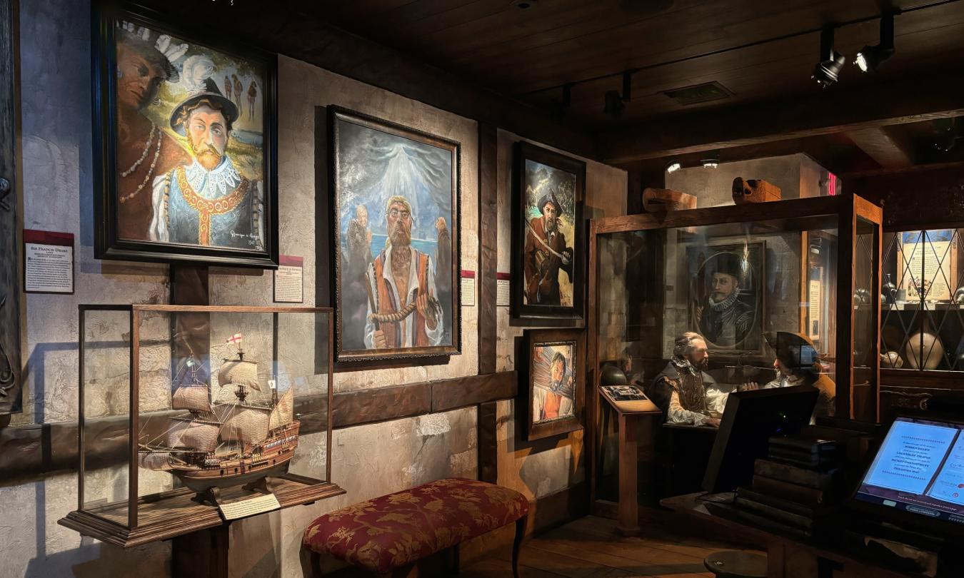 The main room of the Pirate and Treasure Museum has paintings and ship models