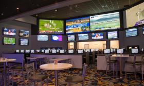 The Simulcast Room at bestbet has numerous large-screen TVs.