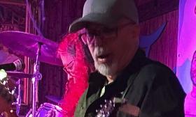 Dennis Miele playing guitar in St. Augustine, Florida with the band Salty Dawg