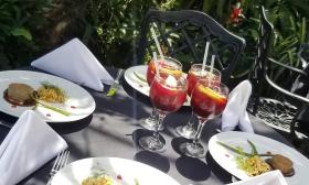 A table for four, on a patio, with tasty bites and sangria on a City Walks Food and Wine Tour