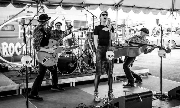 The Magic Flea Circus, performing outdoors under a tent