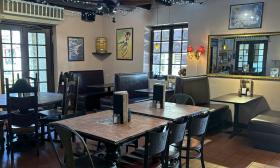 Booths and tables fill the space for indoor dining