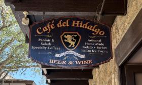 The Café del Hidalgo sign looking out onto St. George Street