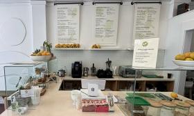 The Sprout Kitchen's counter with the menus displayed above