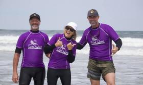 Instructors for SurfQuest posing at Crescent Beach