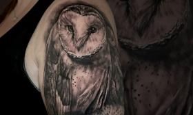 An owl tattoo by Kevin Moore