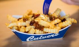 A side tray of chili cheddar fries