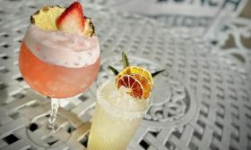 Fruit cocktails with garnishes placed on top