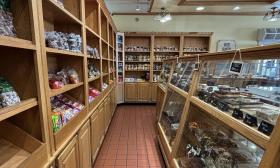 Shelves and glass displays of sweet treats