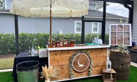 The bar cart with a decorative umbrella