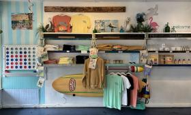 Merchandise arranged on the wall inside the shop