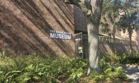 A long shot of the Charleston Museum on a sunny day. 