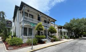 Carriage Way Bed and Breakfast on Cuna Street on a sunny summer day