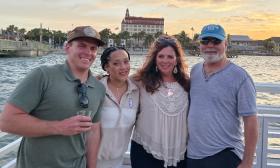 Four guests on a Red Boat Water Tour in St. Augsutine at sunset