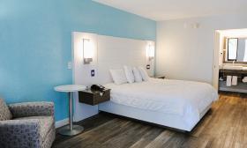 This room, with a king bed, is a large, comfortable room in a hotel near the St. Johns County Pier