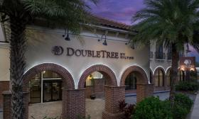 The exterior of the DoubleTree by Hilton St. Augustine Historic District in the evening with a purple sky