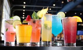 A line of different flavored cocktails