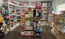 Baby dolls and other knick knacks in the back of the store