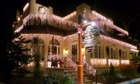 A local bed and breakfast decorated with holiday lights