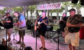 A live band performing at the beach pavilion