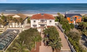 As seen from the air, this large property is right on the beach and has a large lot