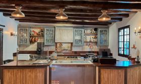 The country-style kitchen/counter space