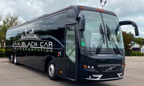 A charter bus used by Jax Black Car Transportation