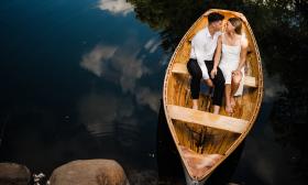 A couple sitting in a boat together