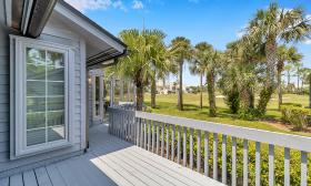 This sunny deck overlooks a golf course at Sawgrass