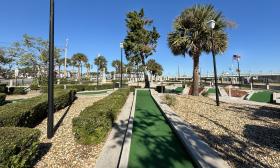 The course looks out over the water and Bridge of Lions