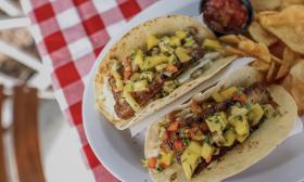 Seafood tacos with a side of chips