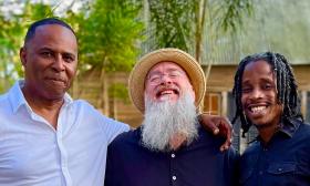 Ace Winn, Marshall Bailey, and Will Neal, members of a trio, outside before a gig