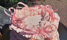 A fully pink, heart-shaped, cake from Choco latte's