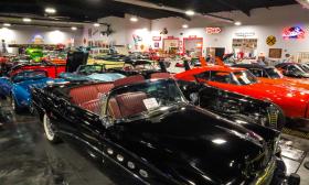 A line of classic cars inside