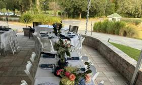 A banquet arranged on the patio of the Golf Club at South Hampton