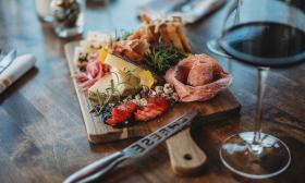 A charcuterie board served at the table