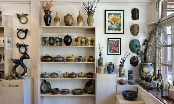 An assortment of vases near the window