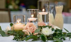 A floral and candle centerpiece