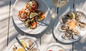 Plates of oysters with toppings