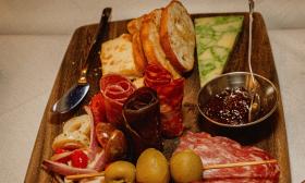 A charcuterie board as presented at La Concina at the Cellar Upstairs, above the San Sebastian Winery