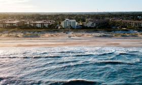 An aerial view of Guy Harvey St. Augustine Beach Resort from the ocean