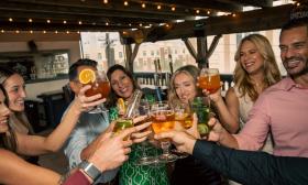 Friends gather for dinner and wine at a winery in St. Augustine