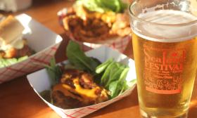 Fried seafood and a beer in a St. Augustine Seafood Festival glass.