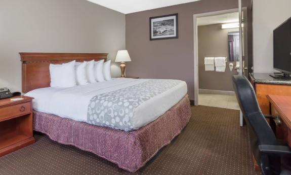 A king guest room at Day's Inn in St. Augustine, with desk and TV