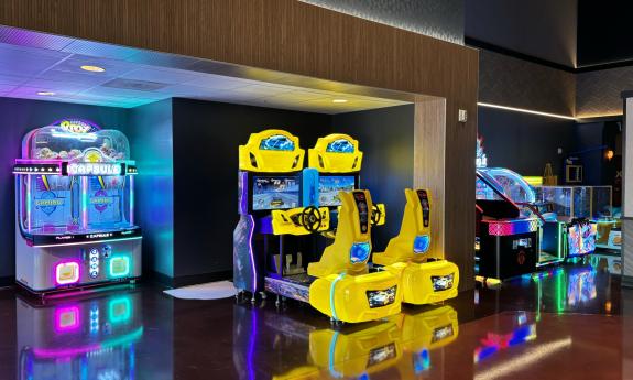 Arcade games line both sides of the lobby