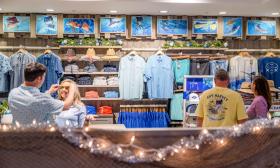 Couples shopping in the retail store at Guy Harvey Resort