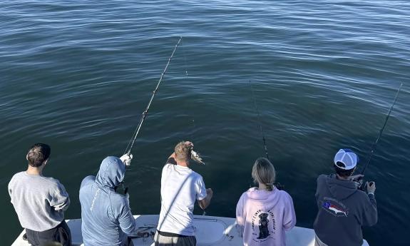 Guests fishing offshore