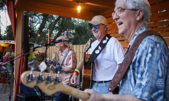 The band members performing live