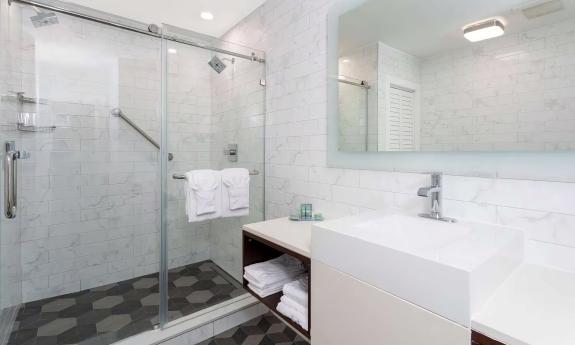 A white hotel bathroom on the beach