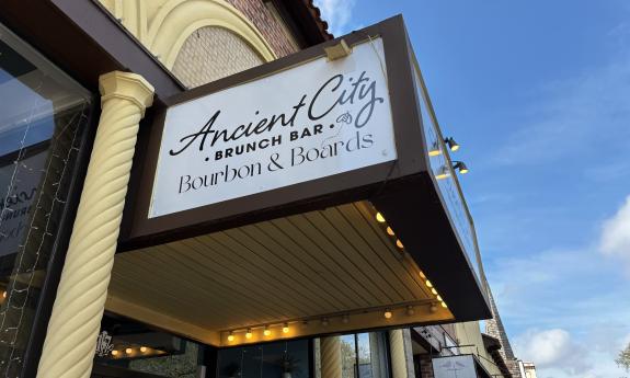 The Ancient City Brunch Bar sign outside on King Street